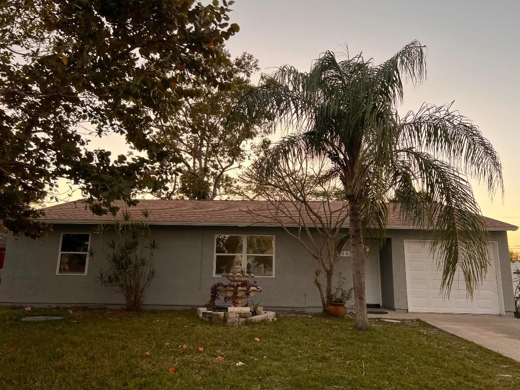 Photo of 838 SE Proctor Lane, Port Saint Lucie, FL 34983 (MLS # R10964935)