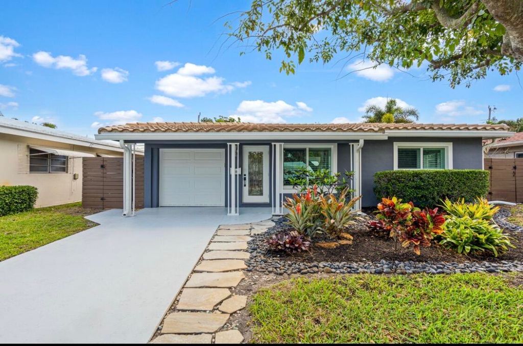 Photo of 4710 NE 3rd Terrace, Oakland Park, FL 33334 (MLS # B26008854)