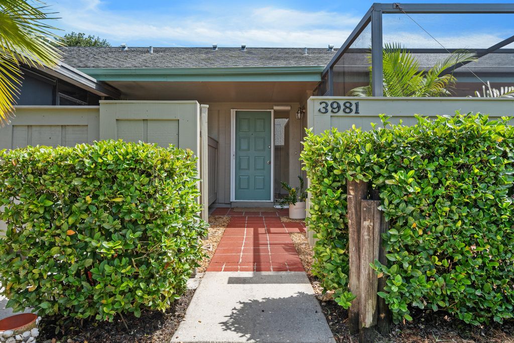 Photo of 3981 NW Cinnamon Tree Circle, Jensen Beach, FL 34957 (MLS # B26054257)