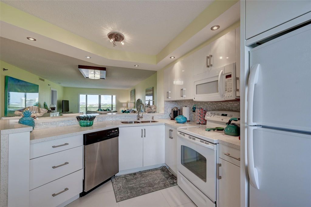 Photo of 2238 N Cypress Bend Dr #807, Pompano Beach, FL 33069 (MLS # F10389558)