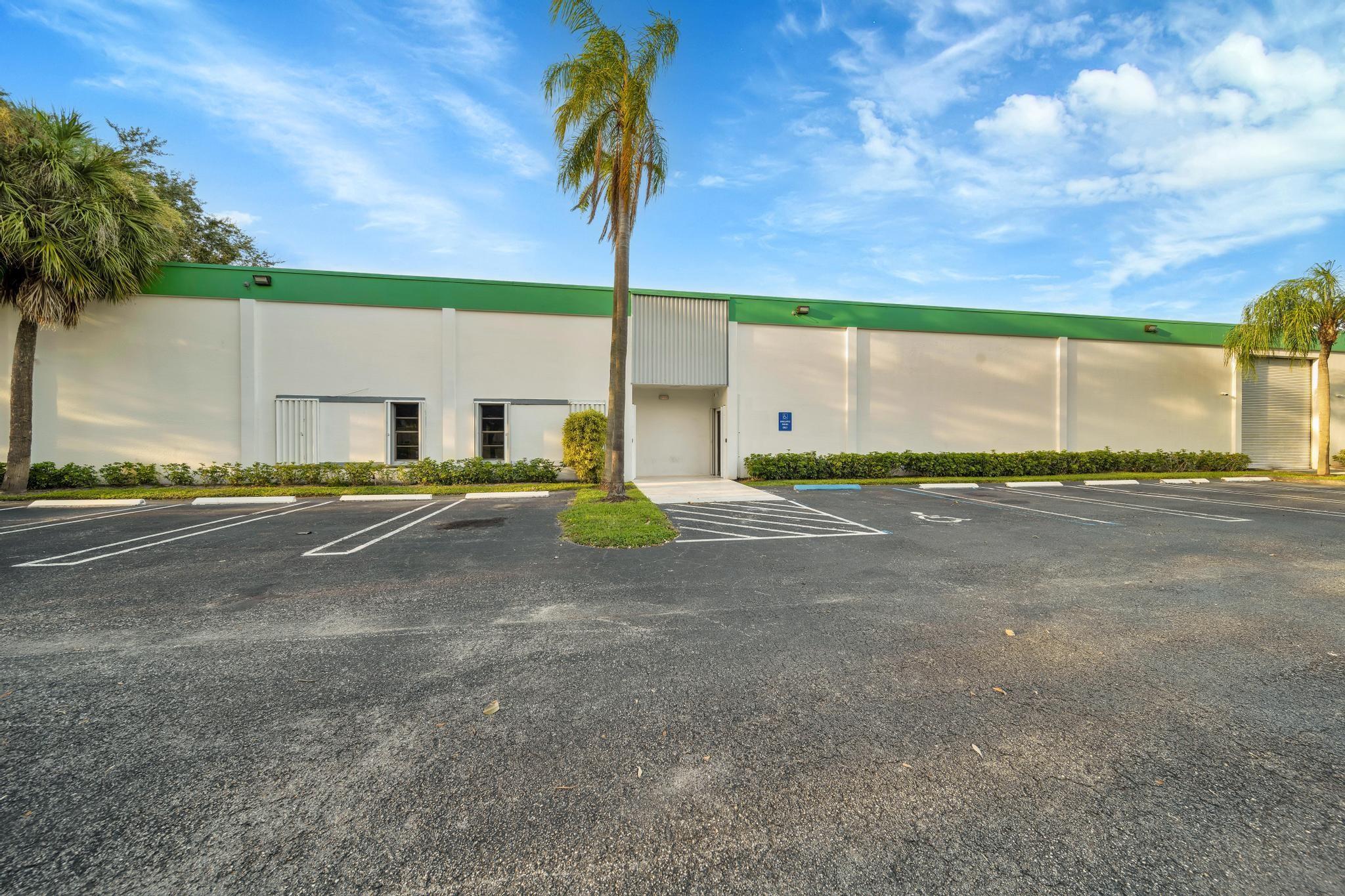Stand-Alone Warehouse Facility for Lease. 28,000 SF available w/ leasing options to lease 7,000, 14,000, or 21,000 SF of the facility. 100% AC. 18 ft ceilings. 5 street-level electric bay doors (14' high), incl 2 under industrial canopy for protected loading/unloading. 1 dock-high bay door for logistical convenience. Fully fire sprinklered. 3-phase electric. New Roof. Energy-efficient LED Hi-Bay lighting throughout. Ceiling exhaust system designed for optimal air circulation. Cat 6 cabling. Accordion shutters on all doors & windows. On-site breakroom. Buildout options available & negotiable. Plenty of parking. IRD zoning. Ideal for manufacturing, distribution, storage, R&D. Located within the Greater Coral Springs Research & Dev Park, offering access to major transportation routes.