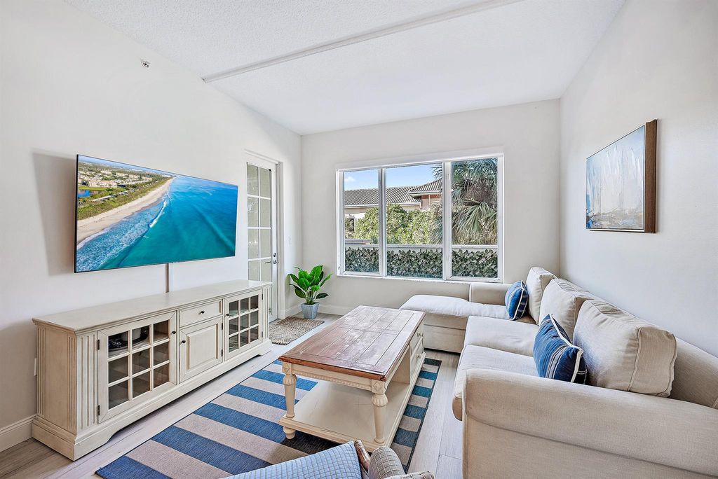 Photo of 1203 Town Center Drive #201, Jupiter, FL 33458 (MLS # R10905658)