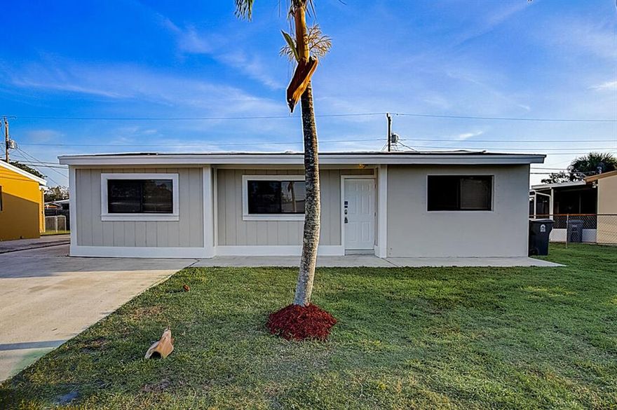 This West Palm Beach one-story home offers a two-car garage.