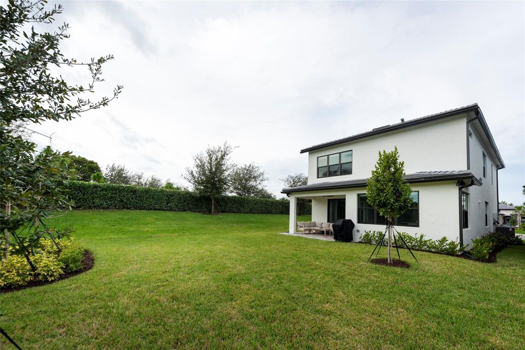 Photo of 4412 Silverwood Lane S, Oakland Park, FL 33309 (MLS # B26041389)