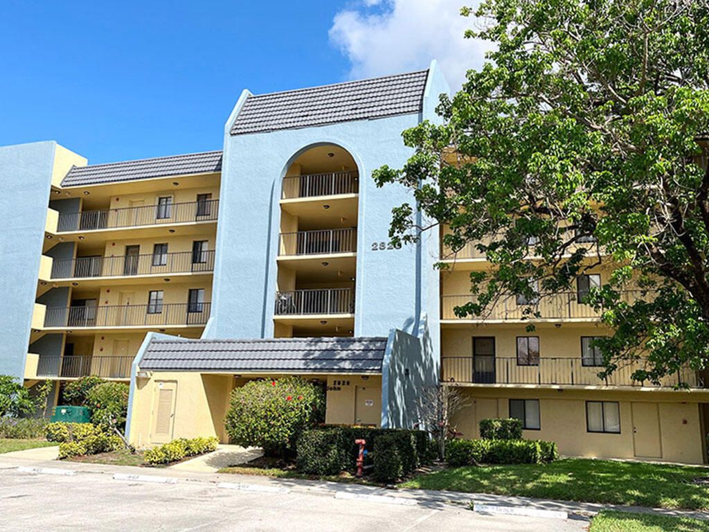 Photo of 2828 Tennis Club Drive #207, West Palm Beach, FL 33417 (MLS # B26045337)