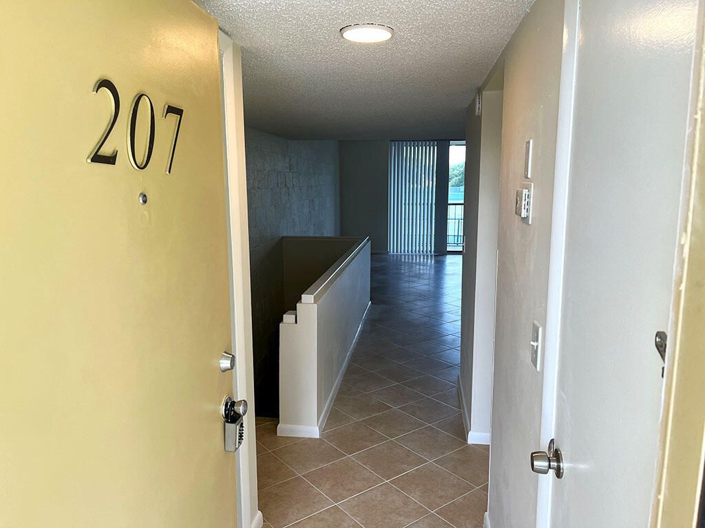 Photo of 2828 Tennis Club Drive #207, West Palm Beach, FL 33417 (MLS # B26045337)