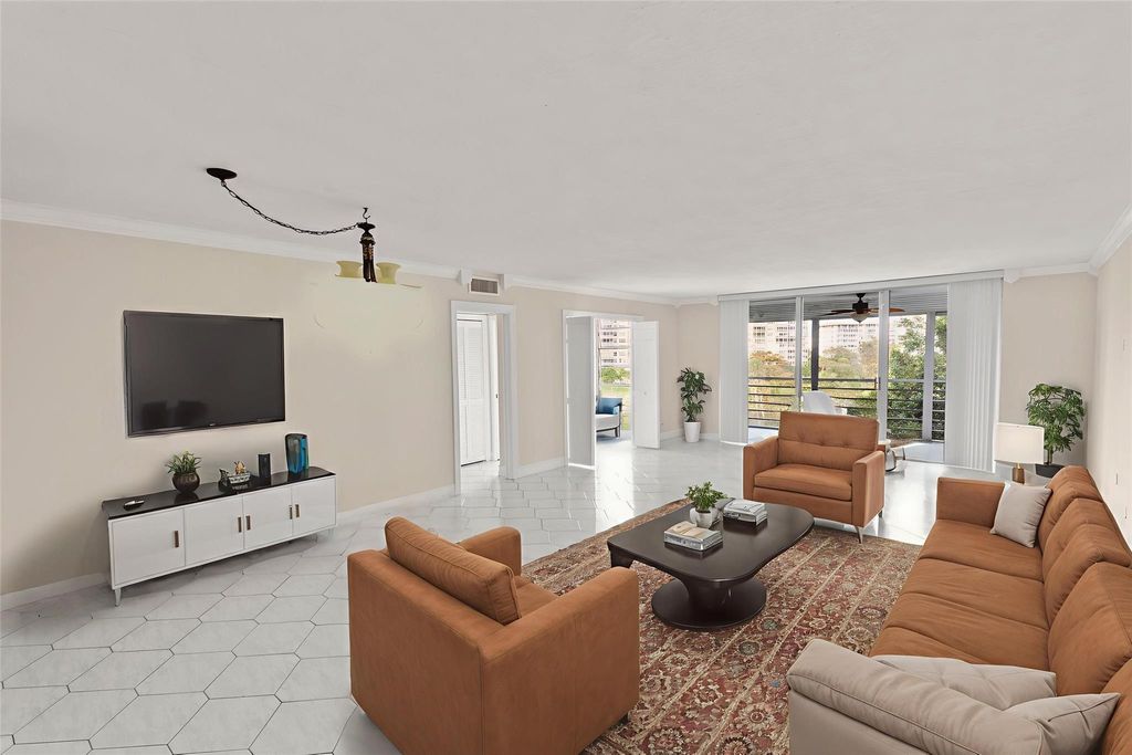 Photo of 3900 Oaks Clubhouse Drive #507, Pompano Beach, FL 33069 (MLS # F10540140)