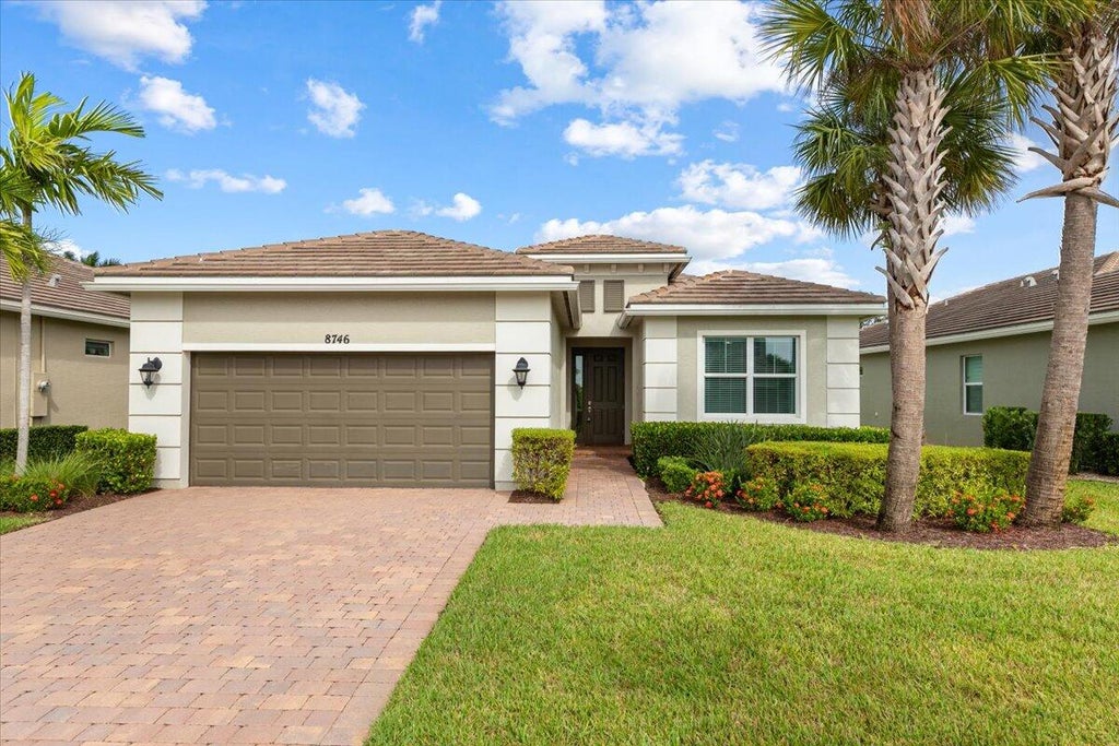 Photo of 8746 SW Vico Way, Port Saint Lucie, FL 34987 (MLS # R11025391)