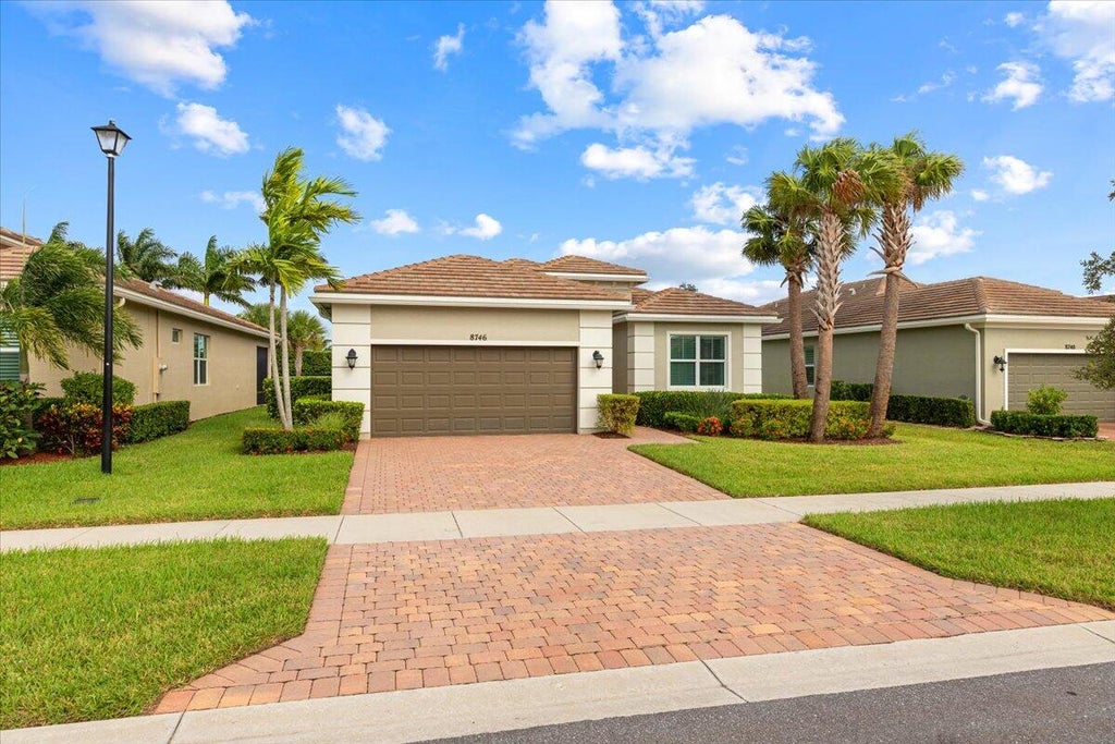 Photo of 8746 SW Vico Way, Port Saint Lucie, FL 34987 (MLS # R11025391)