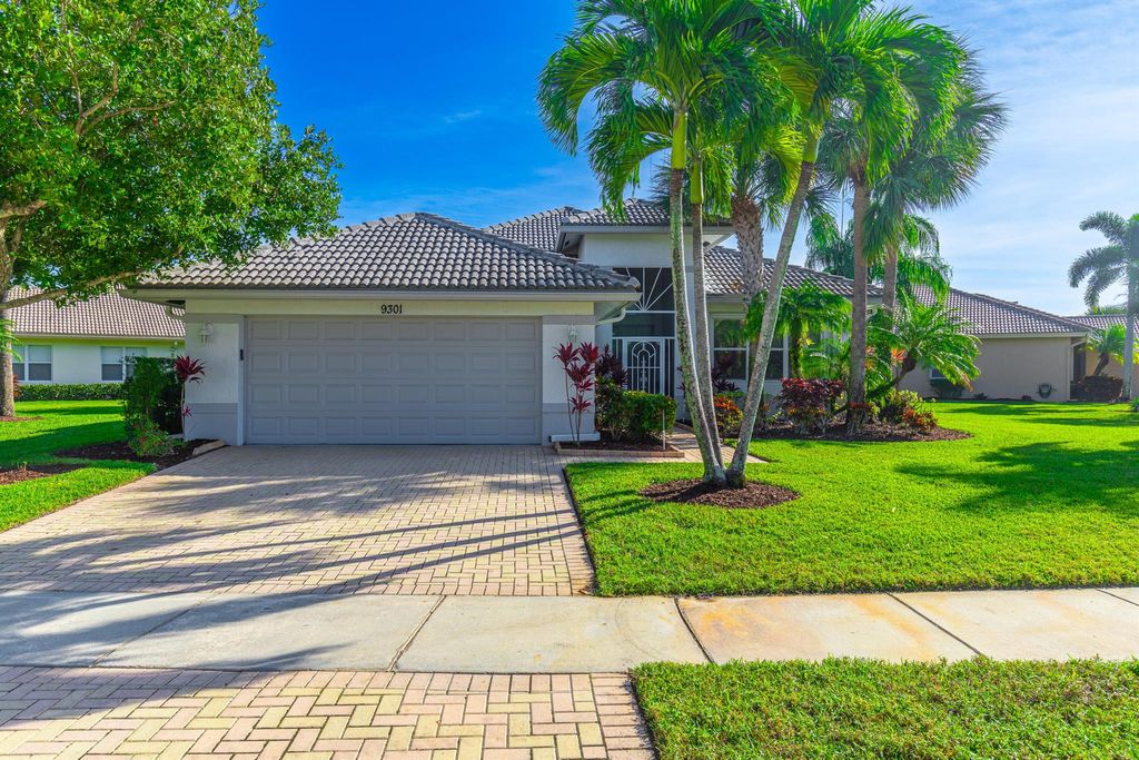 Photo of 9301 Heron Cove Drive, West Palm Beach, FL 33411 (MLS # R11034598)