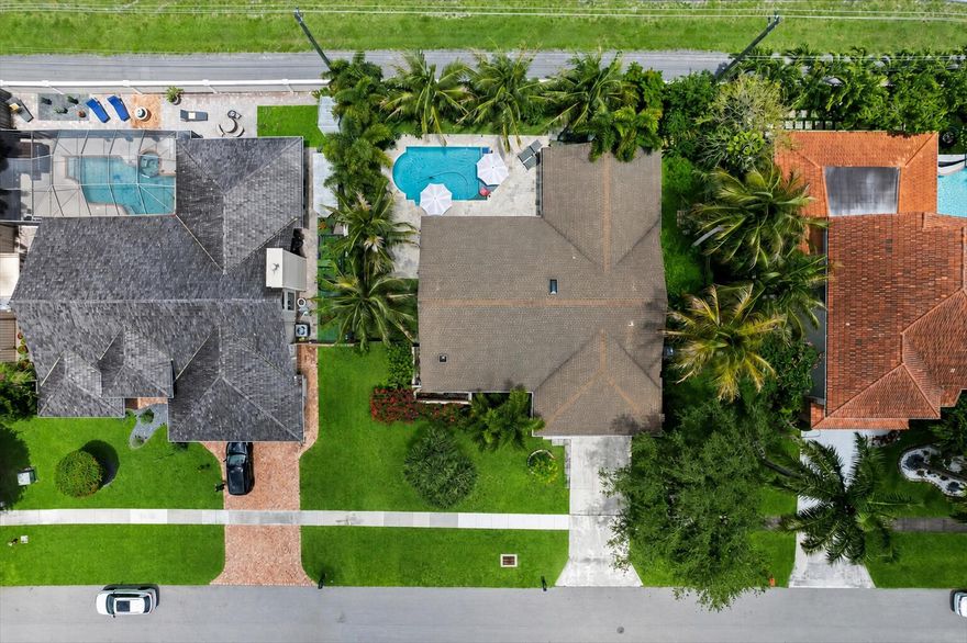 Beautifully updated 4BR/2BA pool home located in the highly desirable Greenview Shores community! This open-concept split floor-plan offers modern upgrades throughout including a fully renovated kitchen with quartz countertops, custom cabinetry, and upgraded appliances. Durable wood-look ceramic tile flooring throughout the main living areas with laminate flooring in the bedrooms. Additional upgrades include impact windows & sliders, interior laundry room, and A/C only 4 years old. Enjoy your private backyard oasis featuring a resurfaced pool and travertine pool deck completed in 2022, retractable screened patio, and fully fenced yard. Located within an A-rated school district and close to shopping, dining, parks, and equestrian venues. Tenant currently in place, making this an excellent