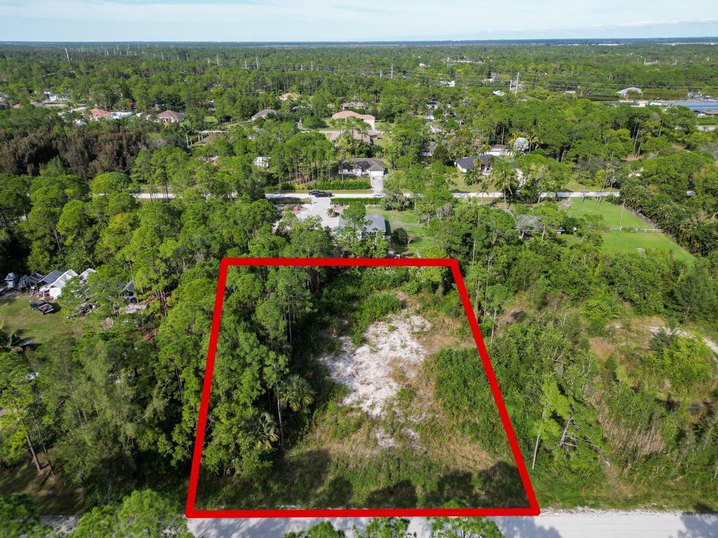 This 1.15-acre lot in Loxahatchee is a clean, ready-to-build canvas surrounded by nature. With no HOA restrictions, top-rated schools, and a prime location just 5 minutes from supermarkets, pharmacies, daycares, and more, it's an irresistible opportunity for you to build your dream home!