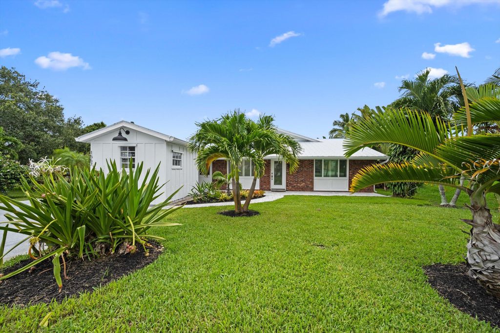 Photo of 1567 NE Sottong Avenue, Jensen Beach, FL 34957 (MLS # R11098284)