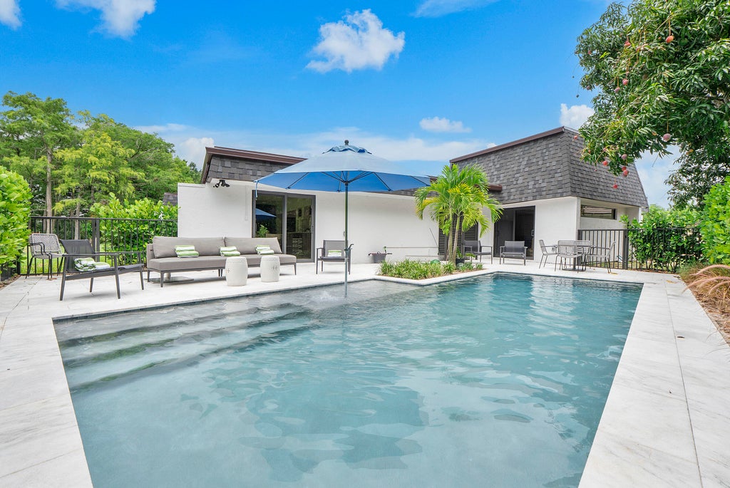 Photo of 4800 Queen Palm Lane, Tamarac, FL 33319 (MLS # B26045807)