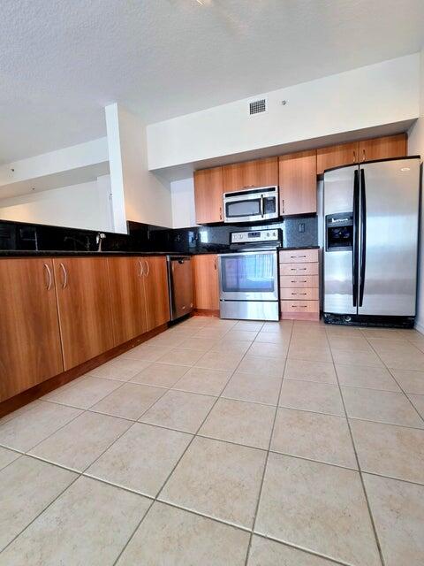 PINEAPPLE GROVE VILLAGE CONDO - Residential Lease