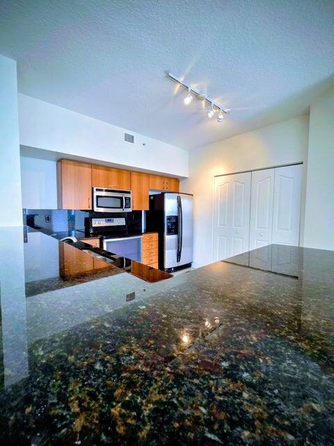 PINEAPPLE GROVE VILLAGE CONDO - Residential Lease