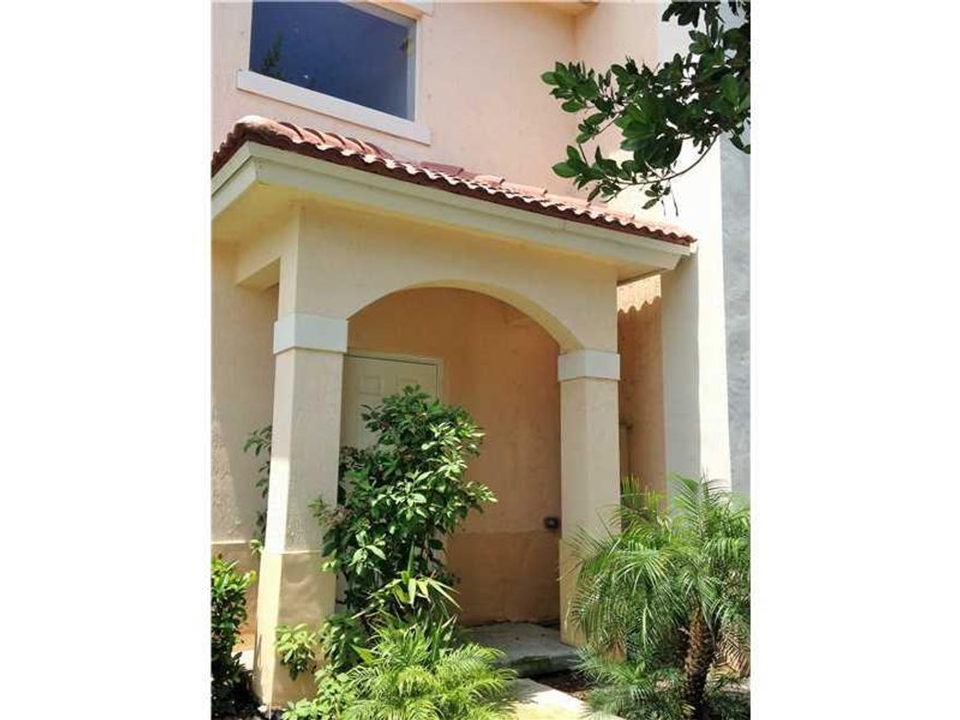 Back on market!! Great corner unit overlooking an open grass area and pool. Gated community. FHA OK!! Great location off quiet street. Shutters in the garage and 2006 construction. Appraised at the listed price... not negotiable.