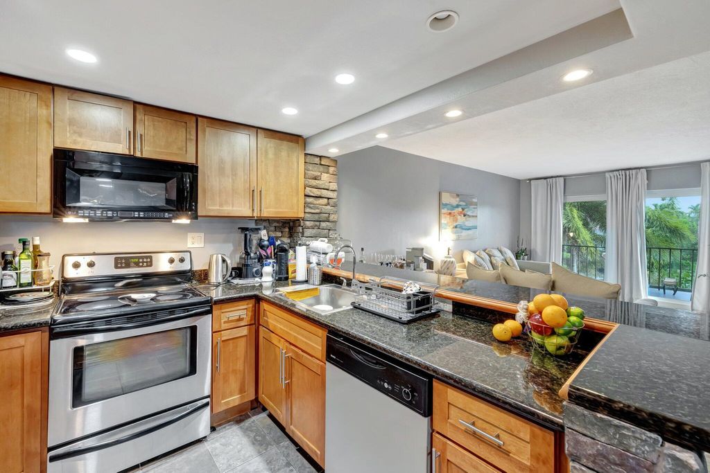 Photo of 3004 NE 5th Terrace #208-c, Wilton Manors, FL 33334 (MLS # B26004309)