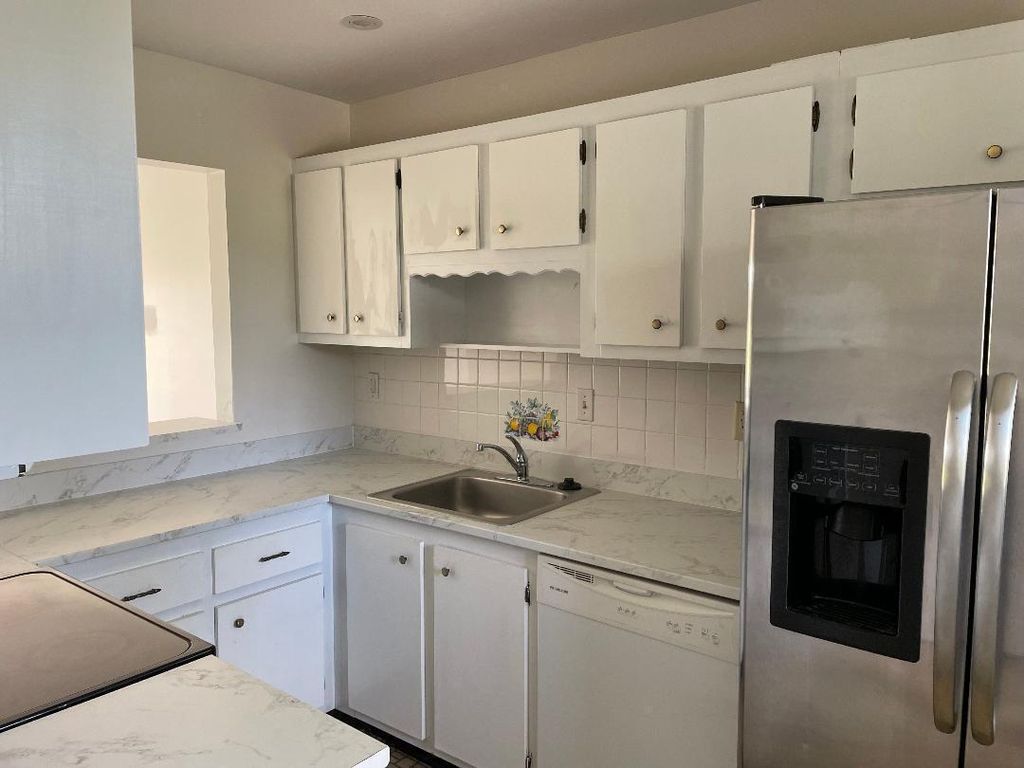 Photo of 5403 SE Miles Grant Road #212, Stuart, FL 34997 (MLS # R11002310)