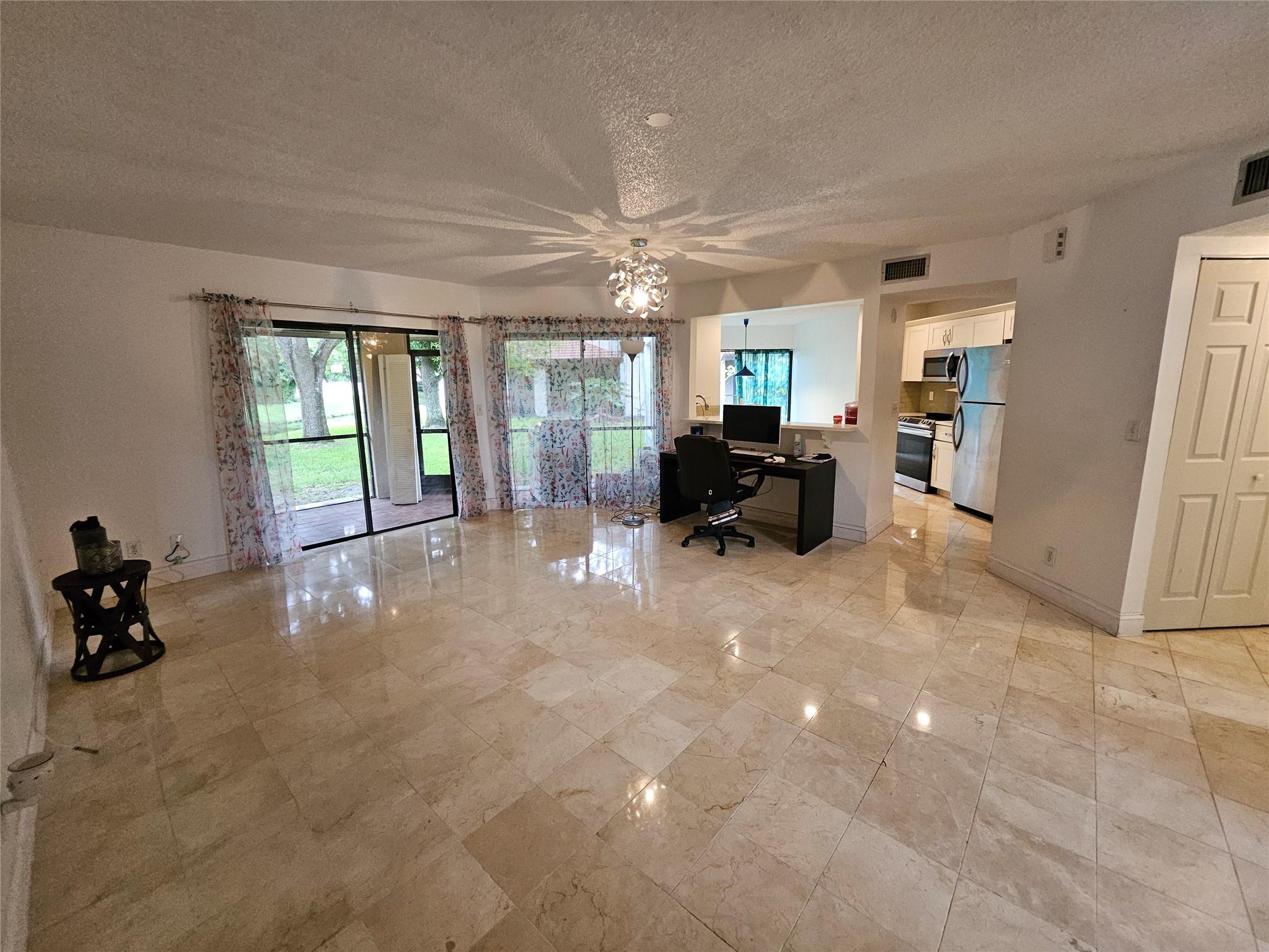 Luxury home at its finest in a gated community, well desired, only minutes to the Sawgrass and the Turnpike, and 595. Features updated kitchen with quartz countertop, antique solid wood soft-close cabinets, AC two years old in 2023, Roof two years old in 2023, range in 2025, Microwave 2025, freshly polished and sealed marble floors on the first floor, then solid wood floors on the second floor, and brand new carpet in the second bedroom. Waterfront property, large backyard access with covered patio lanai. And a large storage closet. With two assigned parking spaces. Seller will credit the buyer $1500 at closing for the buyer's choice of new interior painting.
No leasing or renting permitted during the first year of ownership, per HOA regulations.