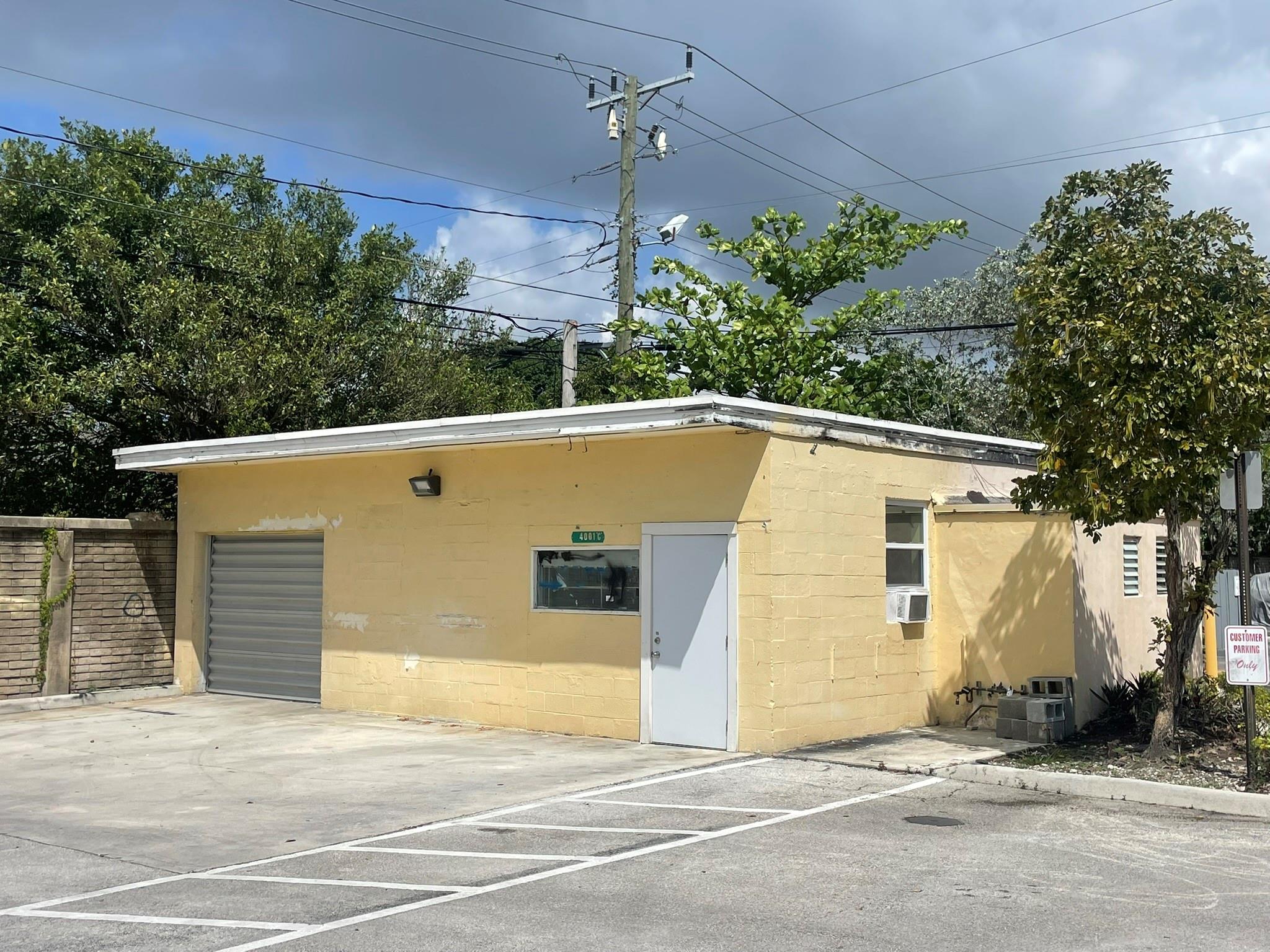 Garage- Workshop- Office with Storage and parking. Great small business use. Small air-conditioned office, 1 bathroom.