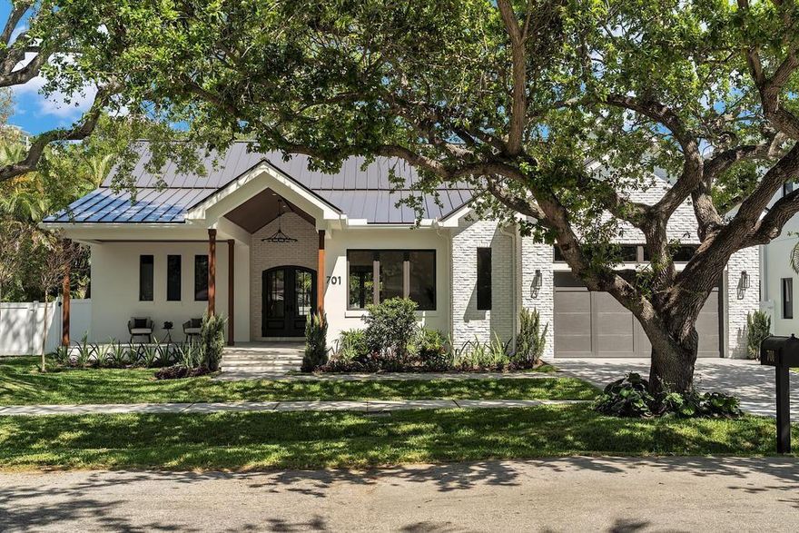 NEW CONSTRUCTION brand new in beautiful Rio Vista in Fort Lauderdale. This 4 bedroom 3 1/2 bath home sits on an oversized lot with salt water pool system, full summer kitchen, large private backyard. Gourmet chef kitchen feauring oversized island, quartz countertops and industrial high end appliances, with walk-in butler pantry. Impact doors and windows throughout home, hard wood floors, 3 A/C units, Natural gas and tankless water heater. Smart home system. Oversized front porch. Extra large garage with EV car charger and room for golf cart. Metal roof with 50 year life expectancy. Located less then 3 miles from beach, walking distance to Las Olas Blvd, resturants, shopping and schools. Large walk in closets in all rooms, vaulted ceilings. This beauty wont last.