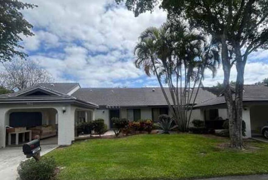 Motivated seller! All offers will be given consideration! Create equity instead of paying for it. Opportunity awaits in Banyan Springs, a desirable gated 55+ community in Boynton Beach. This villa-style home offers a functional layout & is livable as-is, with the ability to update over time to suit your personal style.  This property is priced with condition in mind and presents a great opportunity for buyers looking to customize and add value. Including a reasonably new roof (2023 under 3 yrs), A/C 2021, & brand new water heater. Tight Home, Good Bones, no leaks & zero plumbing issues. Kitchen appliances are older but operational, including the refrigerator, stove, & oven. The dishwasher is stainless steel and in good working condition. The microwave will need repair or replacement.   Additional features include a spacious screened patio, 2-car parking with covered carport, & solid major components. Banyan Springs offers a wide range of amenities, including a clubhouse, pool, fitness center, tennis, and an active social calendar. The HOA covers exterior maintenance, roof, landscaping, cable, and common areas, helping simplify ownership.  A great opportunity to personalize a home in a well-established community with strong value potential. Will not last at this price!