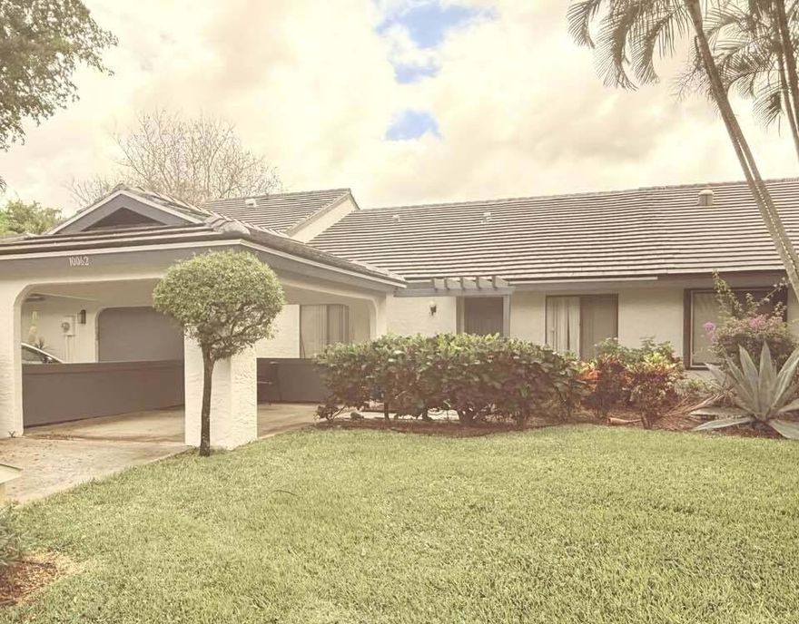 Create equity instead of paying for it. Opportunity awaits in Banyan Springs, a desirable gated 55+ community in Boynton Beach. This villa-style home offers a functional layout & is livable as-is, with the ability to update over time to suit your personal style.  This property is priced with condition in mind and presents a great opportunity for buyers looking to customize and add value. Kitchen appliances are older but operational, including the refrigerator, stove, & oven. The dishwasher is stainless steel and in good working condition. The microwave will need repair or replacement.  Additional features include a spacious screened patio, 2-car parking with covered carport, & solid major components, including a reasonably newer roof, newer A/C system, & recently replaced water heater. Banyan Springs offers a wide range of amenities, including a clubhouse, pool, fitness center, tennis, and an active social calendar. The HOA covers exterior maintenance, roof, landscaping, cable, and common areas, helping simplify ownership.  A great opportunity to personalize a home in a well-established community with strong value potential. Will not last at this price!