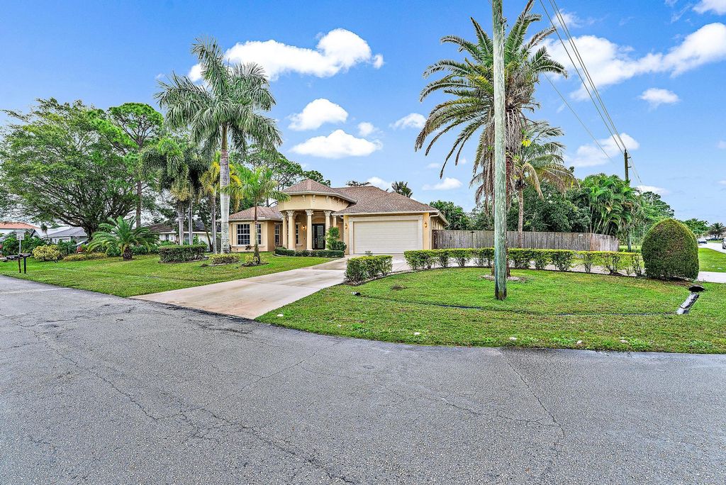 Photo of 402 SE Volkerts Terrace, Port Saint Lucie, FL 34983 (MLS # R10955158)