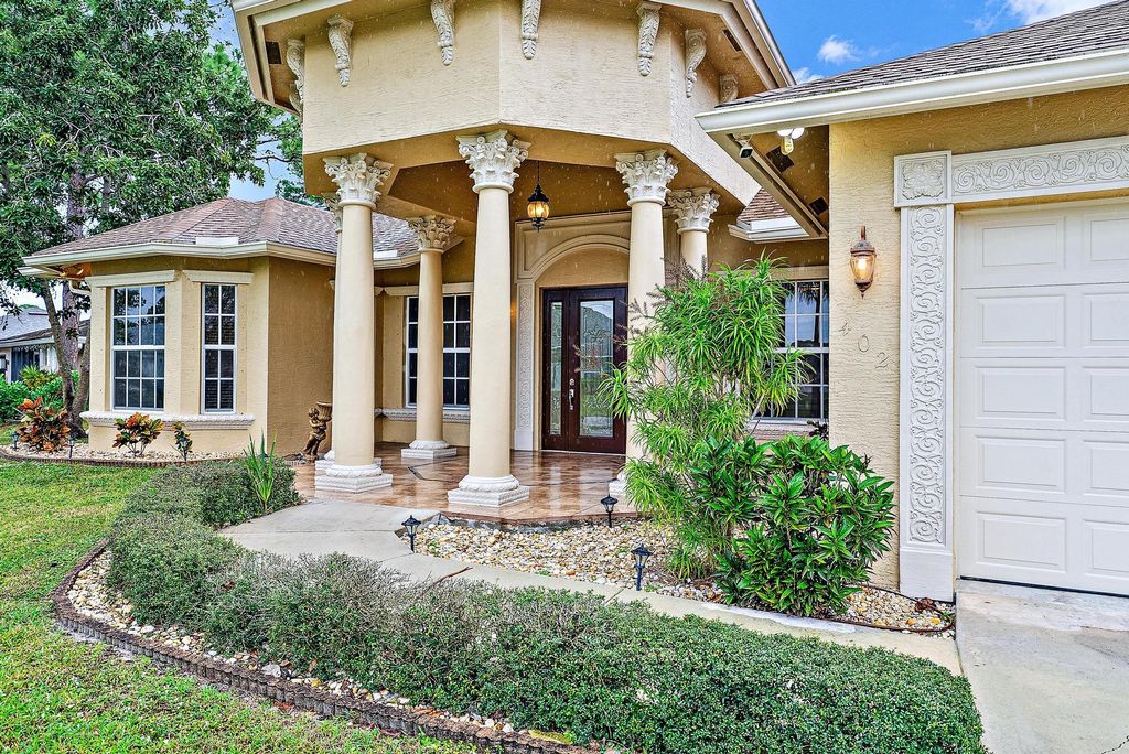 Photo of 402 SE Volkerts Terrace, Port Saint Lucie, FL 34983 (MLS # R10955158)