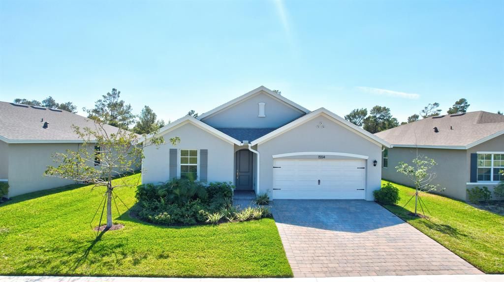 Photo of 1554 NE White Pine Terrace, Jensen Beach, FL 34957 (MLS # R10870311)