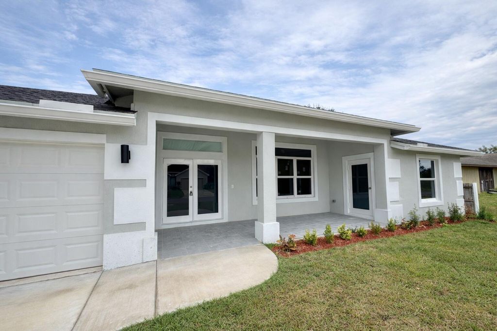 Photo of 655 SW Seagull Terrace, Port Saint Lucie, FL 34953 (MLS # B26015357)