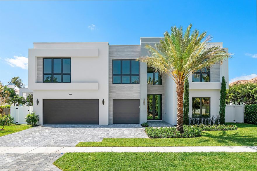 Contemporary sophistication and a prime Golden Triangle location. Just blocks to Mizner Park and downtown Boca Raton, this just completed five-bedroom estate features a grand open floor plan, with expansive two-island kitchen (two sinks, two dishwashers), a two-story living room, expandable dining room, and large family room. A first-floor bedroom is an ideal office or in-law suite, while upstairs you'll find three junior suites, plus a light filled primary with extended closets and spa inspired bath. Outside the south facing marble patio features a built-in summer kitchen, heated saltwater pool and spa, plus plenty of room for pups or playsets.  Walkable to Mizner Park a Moke ride away from The Boca Raton and beaches, this home is not to be missed!
