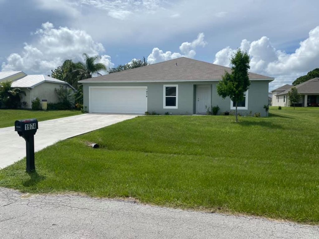 Photo of 1974 SW Lennox Street, Port Saint Lucie, FL 34953 (MLS # R10737980)