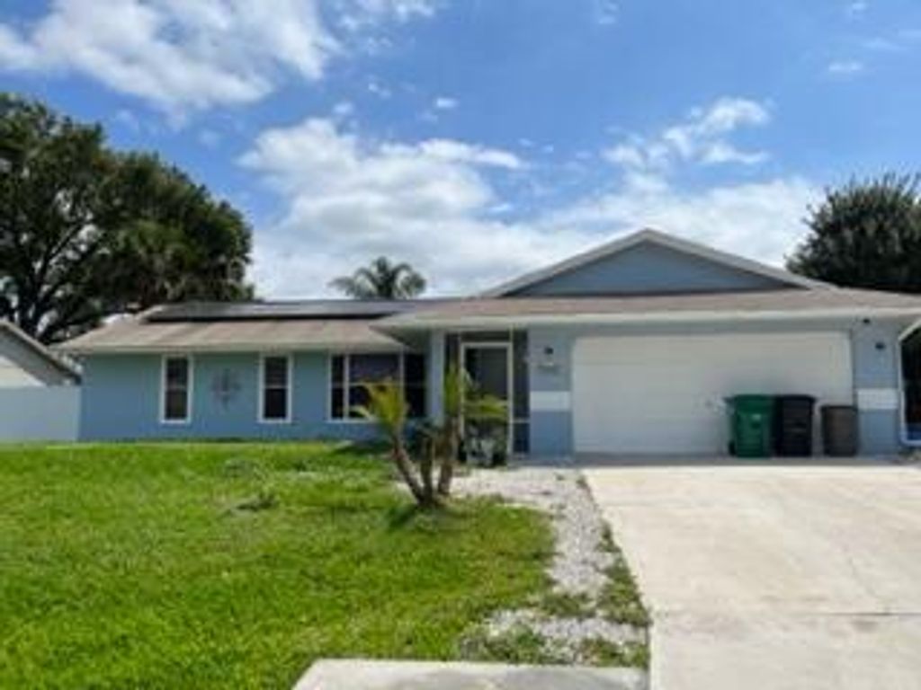 Photo of 2321 SW Freeman Street St, Port St Lucie, FL 34953 (MLS # R10789239)