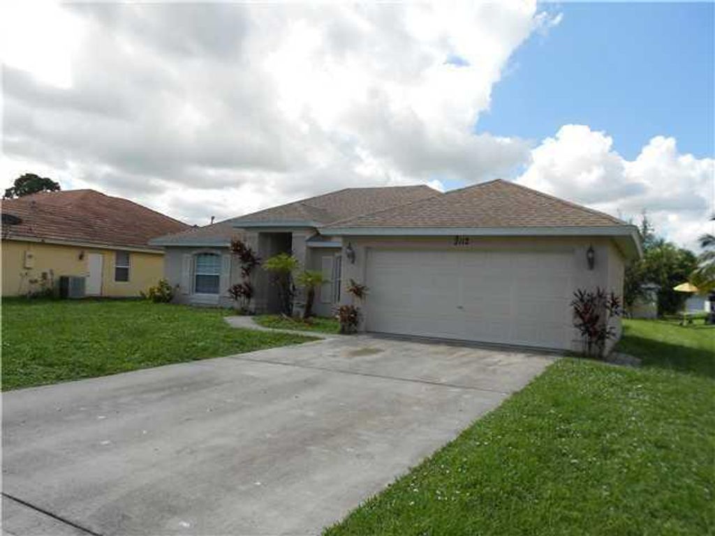 Photo of 2112 SW Burlington Street, Port Saint Lucie, FL 34984 (MLS # R11129021)