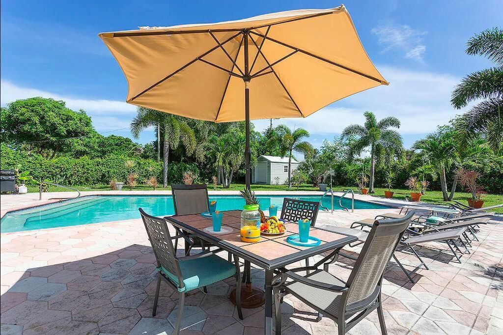 Photo of 272 NW 45th Street, Boca Raton, FL 33431 (MLS # B26020098)