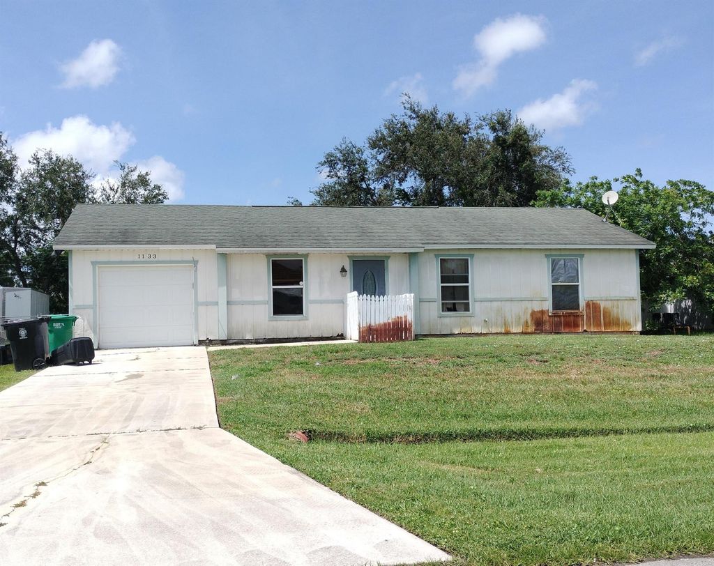 Photo of 1133 SW Sudder Avenue, Port St Lucie, FL 34953 (MLS # R10915562)