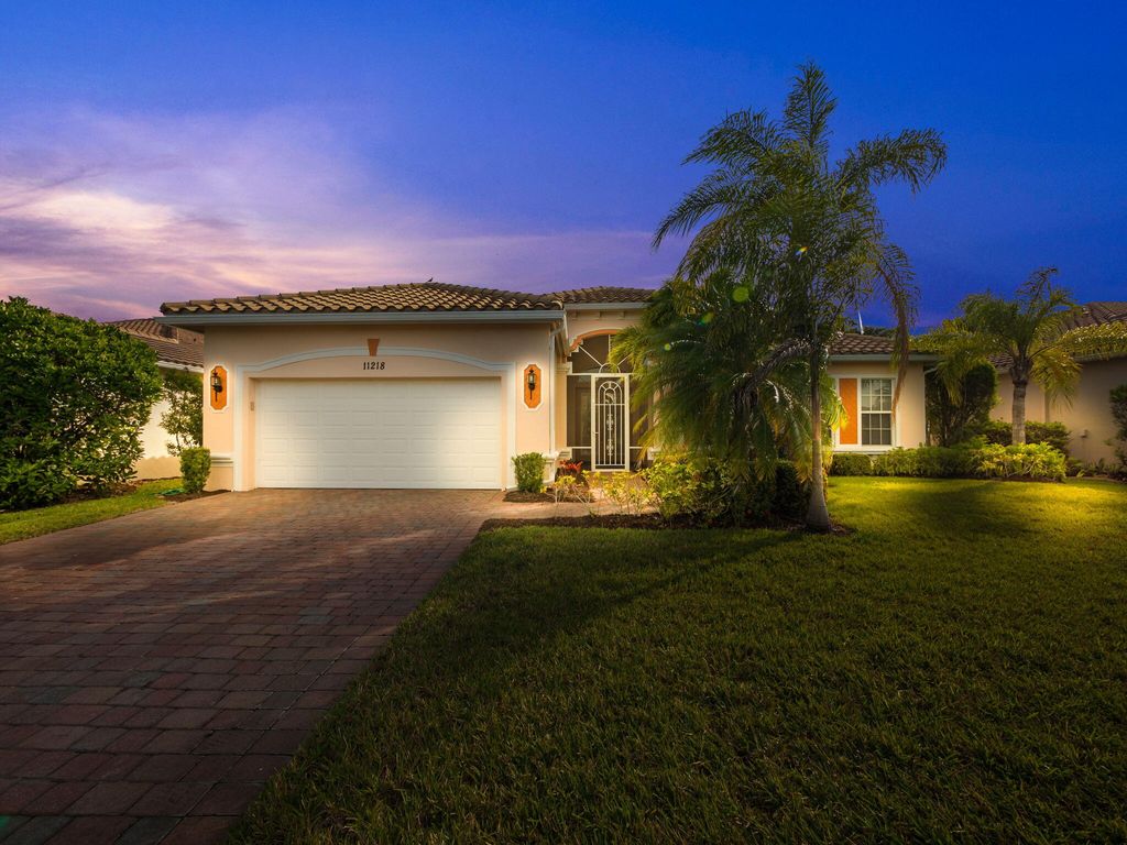 Photo of 11218 SW Apple Blossom Trail, Port Saint Lucie, FL 34987 (MLS # R10977389)