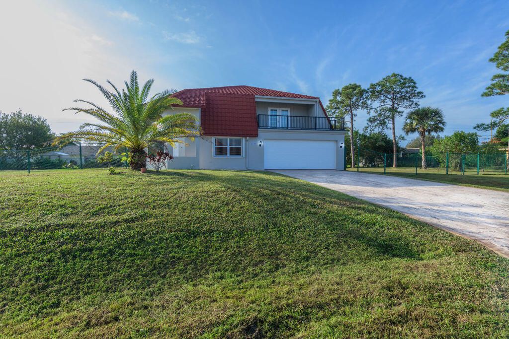 Photo of 1250 SW San Antonio Avenue, Port Saint Lucie, FL 34953 (MLS # R10940287)