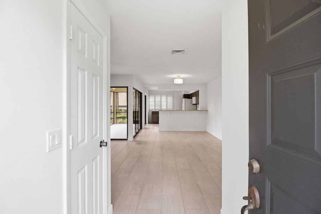 Photo of 3961 SW Greenwood Way #B, Palm City, FL 34990 (MLS # B26032674)
