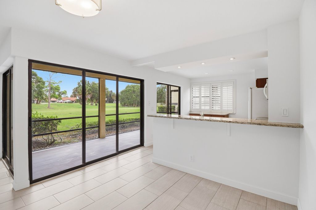 Photo of 3961 SW Greenwood Way #B, Palm City, FL 34990 (MLS # B26032674)