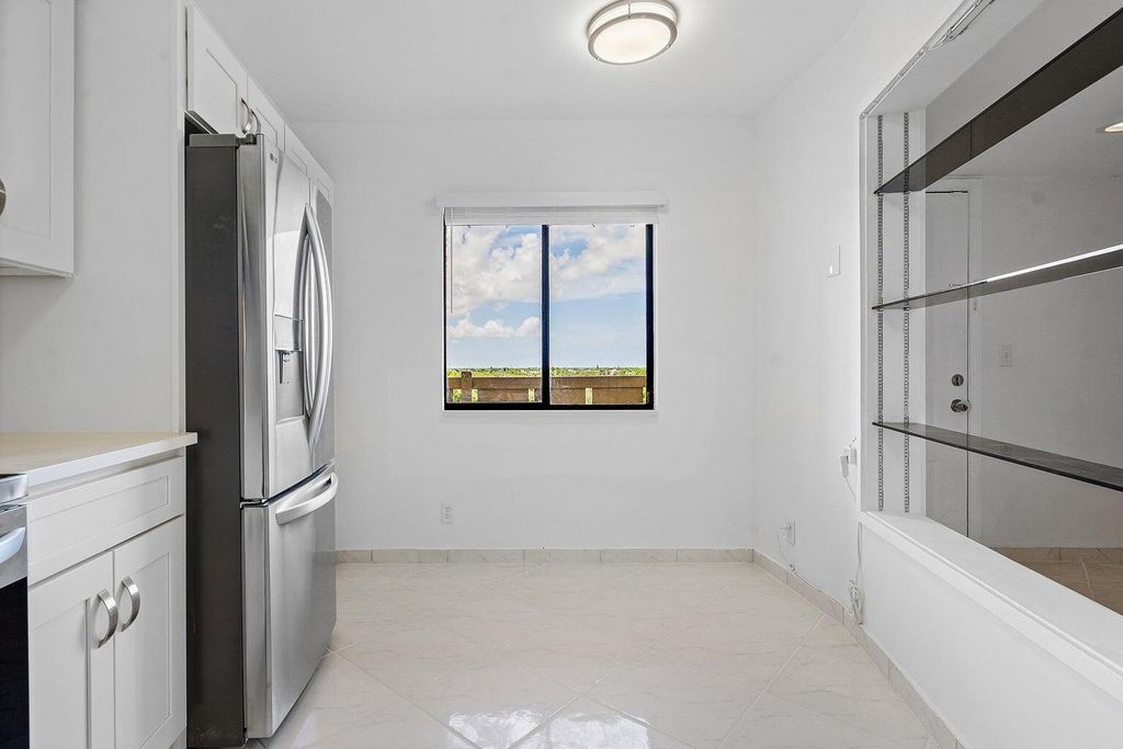Photo of 14475 Strathmore Lane #707, Delray Beach, FL 33446 (MLS # B26030009)