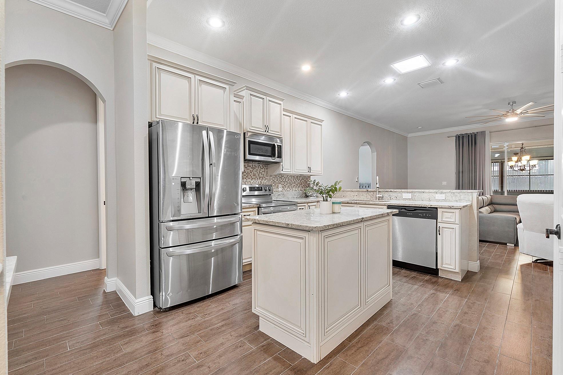 Stunning 4-Bedroom Home in Torino. NO HOA! This modern gem in the highly desirable Torino area is a must-see! Featuring 4 bedrooms, 3 full baths, elegant tile flooring, and crown moldings, this home exudes sophistication. High ceilings create a bright, open feel, while the screened-in patios with A/C add versatile living spaces. The lush yard boasts mature fruit trees, perfect for outdoor enjoyment. Stay secure with installed cameras and a SimpliSafe system. The spacious kitchen features stainless steel appliances, granite countertops, and ample cabinet space. The split-bedroom layout ensures privacy, while the luxurious primary suite offers a spa-like bath and walk-in closets. With NO HOA and endless upgrades, this home offers unbeatable value! Don’t miss out—schedule your showing today!