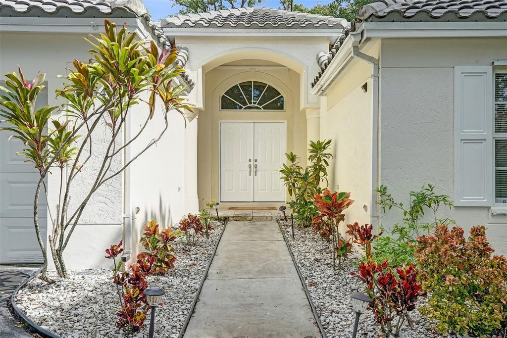 Photo of 3564 Sanctuary Dr, Coral Springs, FL 33065 (MLS # F10531989)