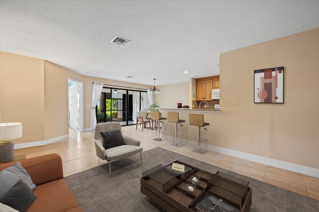 Photo of 400 Crosswinds Drive #B1, Greenacres, FL 33413 (MLS # R10929242)