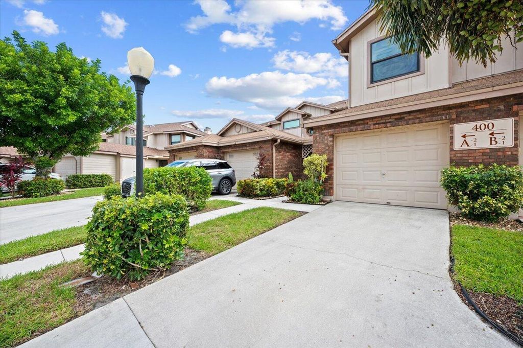 Photo of 400 Crosswinds Drive #B1, Greenacres, FL 33413 (MLS # R10929242)