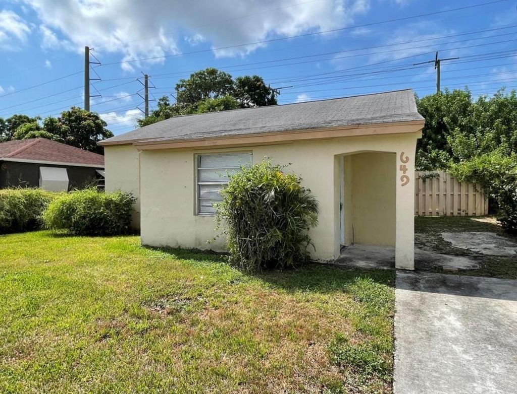 Photo of 649 W 1st St #1, Riviera Beach, FL 33404 (MLS # F10492407)