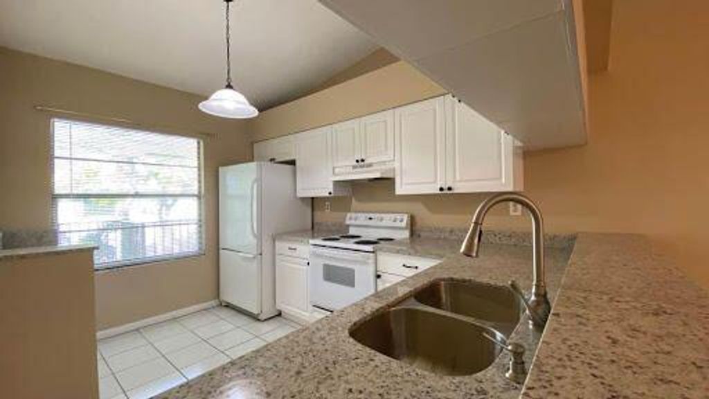 Photo of 1901 Sabal Ridge Court #H, Palm Beach Gardens, FL 33418 (MLS # R11061611)