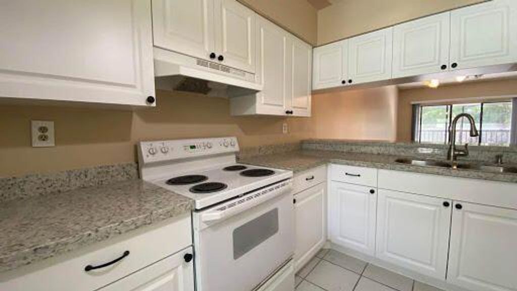 Photo of 1901 Sabal Ridge Court #H, Palm Beach Gardens, FL 33418 (MLS # R11061611)